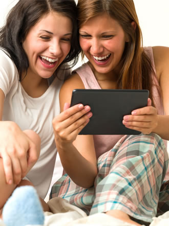 Two woman laughing