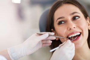 woman smiling at the dentist