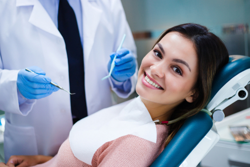 woman smiling at the dentist