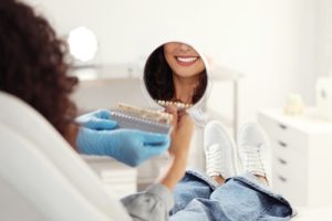 woman looking at her smile